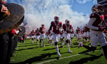 The NC State football team takes to the field against Clemson in 2021. Photo by Marc Hall